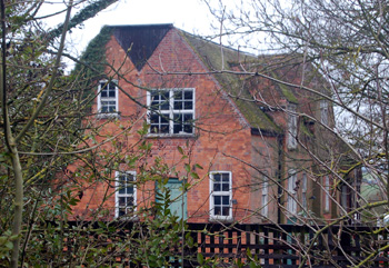 The Old Mill seen from the A6 February 2011